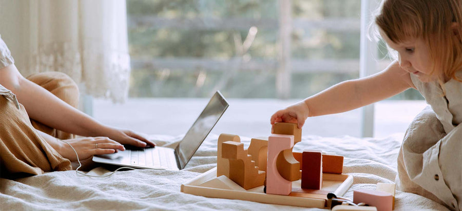 The baby is playing with blocks